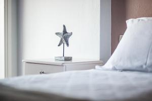 Postel nebo postele na pokoji v ubytování Pension Oniro