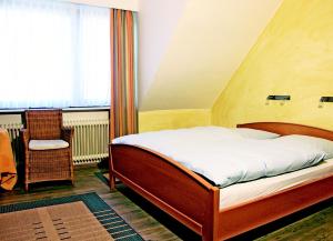 Krevet ili kreveti u jedinici u okviru objekta Hotel-Restaurant Nord-Stuv