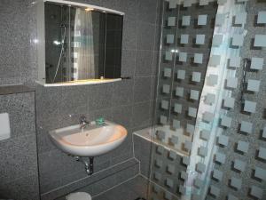 Koupelna v ubytování Hotel-Restaurant Nord-Stuv