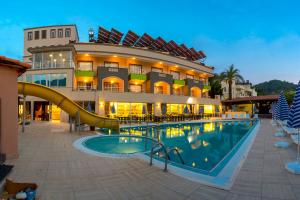 The swimming pool at or close to Rich Melissa Hotel