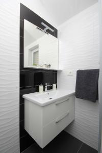 Ванна кімната в Apartments Tomaš