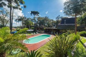 A piscina localizada em La Dolce Vita Park Hotel - Próximo a Curitiba ou nos arredores