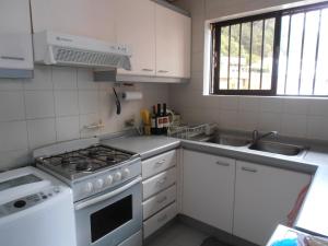 Virtuvė arba virtuvėlė apgyvendinimo įstaigoje Condesa del Mar