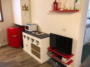 Kuchyňa alebo kuchynka v ubytovaní Appartamento Rosso