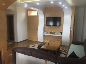 TV o dispositivi per l'intrattenimento presso Apartment Poturmahala