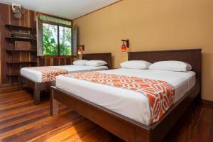 
Cama o camas de una habitación en Laguna Lodge
