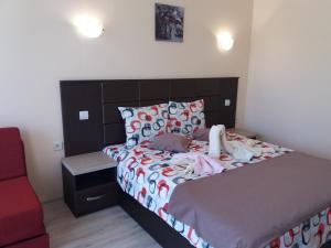 A bed or beds in a room at Hotel Sirena