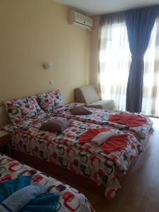 A bed or beds in a room at Hotel Sirena
