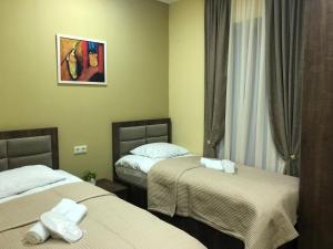 Een bed of bedden in een kamer bij Ametapi