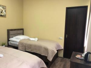 Een bed of bedden in een kamer bij Ametapi