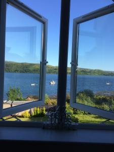 a view of a lake from a window at Tigh Na Mara in Furnace