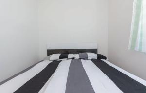 Postel nebo postele na pokoji v ubytování Kira House