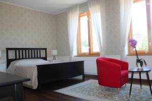 Giường trong phòng chung tại Villa Neubad