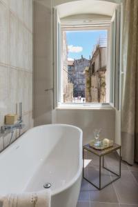 Koupelna v ubytování Riva Palace