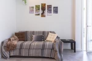 A seating area at Milano Business Balcony Flat