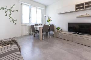 A television and/or entertainment centre at Milano Business Balcony Flat