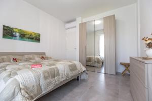 Posteľ alebo postele v izbe v ubytovaní Milano Business Balcony Flat