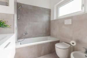 A bathroom at Milano Business Balcony Flat