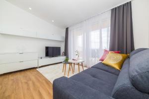 TV a/nebo společenská místnost v ubytování Apartmani Ana