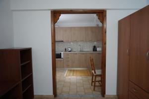 Kuchyň nebo kuchyňský kout v ubytování Anastasia' s guest house