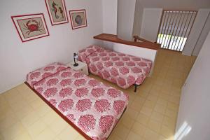 Ένα ή περισσότερα κρεβάτια σε δωμάτιο στο Residence Diapason