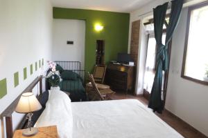 Postel nebo postele na pokoji v ubytování Casa Virgilio