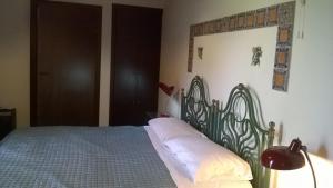 Krevet ili kreveti u jedinici u okviru objekta Turismo Rurale Baglio Fastuchera