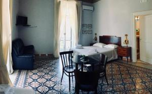 Postelja oz. postelje v sobi nastanitve Borgo Civico 10