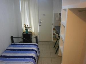 เตียงในห้องที่ La Casa Azul Hostal y Pension - Coatepec