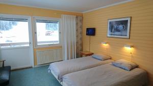 Postel nebo postele na pokoji v ubytování Bollegården B&B