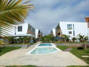 Villa con piscina en un complejo en Zorritos Apartment, en Tumbes
