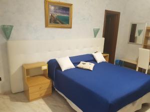 A bed or beds in a room at Il Laghetto