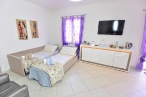 Μια τηλεόραση ή/και κέντρο ψυχαγωγίας στο IzzHome Regina Margherita