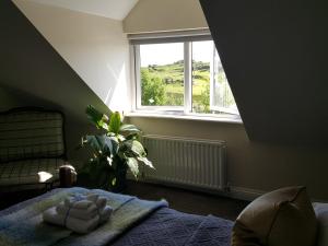 Letto o letti in una camera di Hillside Lodge B&B