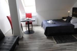 Posteľ alebo postele v izbe v ubytovaní Rabie Aparthotel