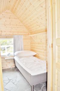 Postel nebo postele na pokoji v ubytování Cape Marina Lodge