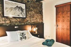 Letto o letti in una camera di Hostal Cisco de Sans