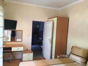 TV a/nebo společenská místnost v ubytování Apartments Villa Majda