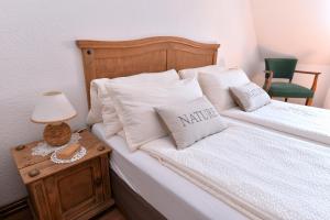 Postel nebo postele na pokoji v ubytování Eden des choux