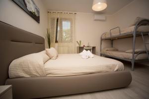 a bedroom with two bunk beds in a room at B&B Villa Gaudium in Pompei +43 photos