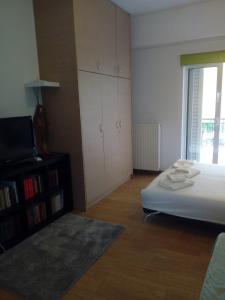 Giường trong phòng chung tại odys apartment centrer of town