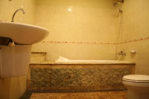 Koupelna v ubytování De Puspa Residence Seminyak