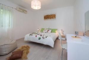 Postel nebo postele na pokoji v ubytování "NM" Luxury apartments