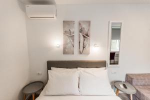 Posteľ alebo postele v izbe v ubytovaní King's Street Apartments
