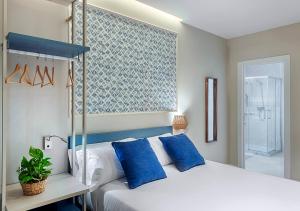 Posteľ alebo postele v izbe v ubytovaní Opera House Valencia B&B