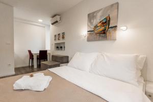 Posteľ alebo postele v izbe v ubytovaní King's Street Apartments