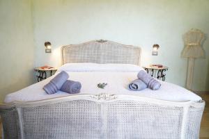 Postel nebo postele na pokoji v ubytování Masseria Le Terrazze di Serranova