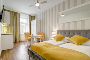 Ein Bett oder Betten in einem Zimmer der Unterkunft 3 City Apartments - Solaro
