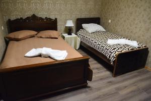 Uma cama ou camas num quarto em ART-Rabat