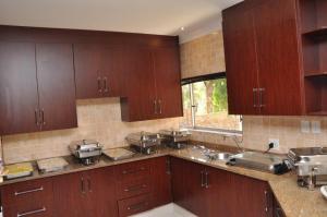 Kuchyň nebo kuchyňský kout v ubytování Montana Boutique Guesthouse